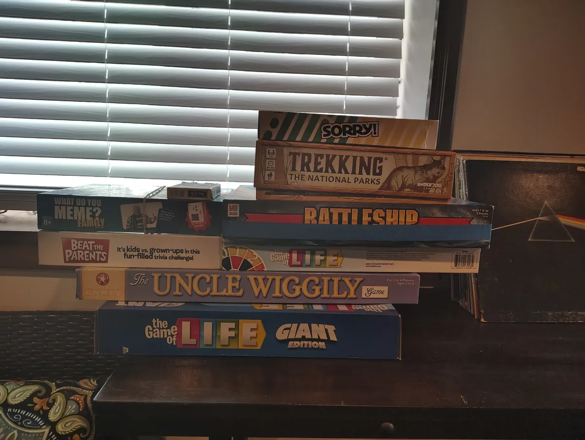 Board game library on a shelf