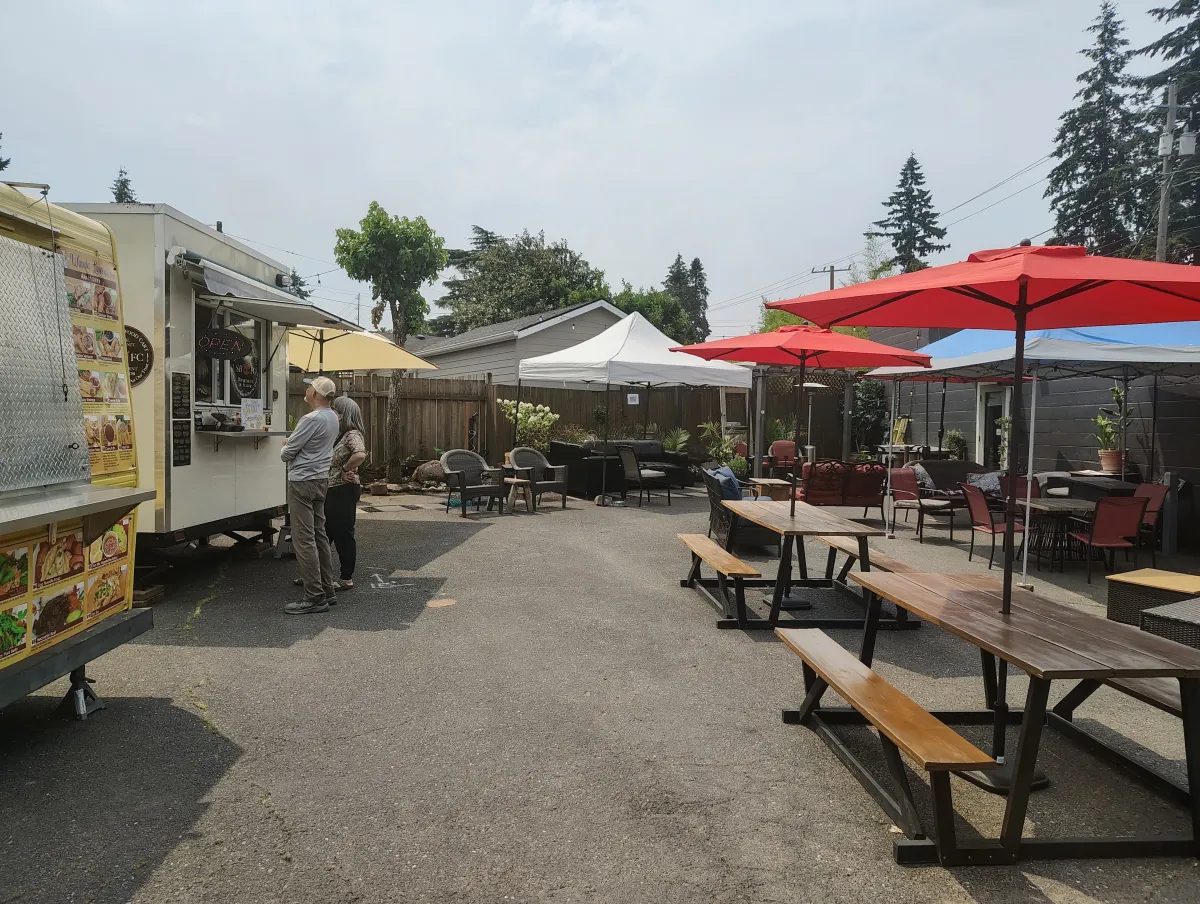 Food carts and covered seating at The Back Patio